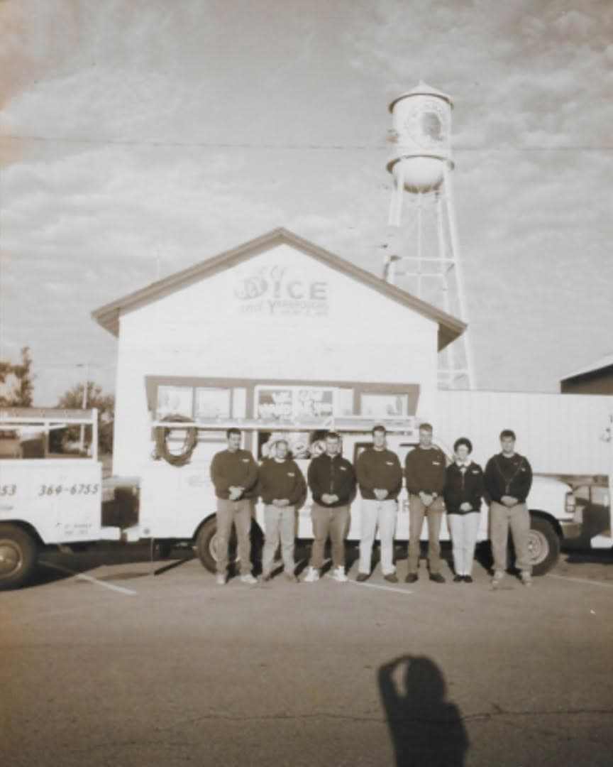 The original Yarbrough and Sons crew with company service trucks in 1988